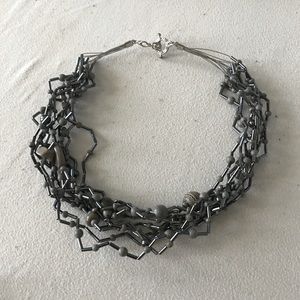 Brand new contemporary grey and charcoal necklace.